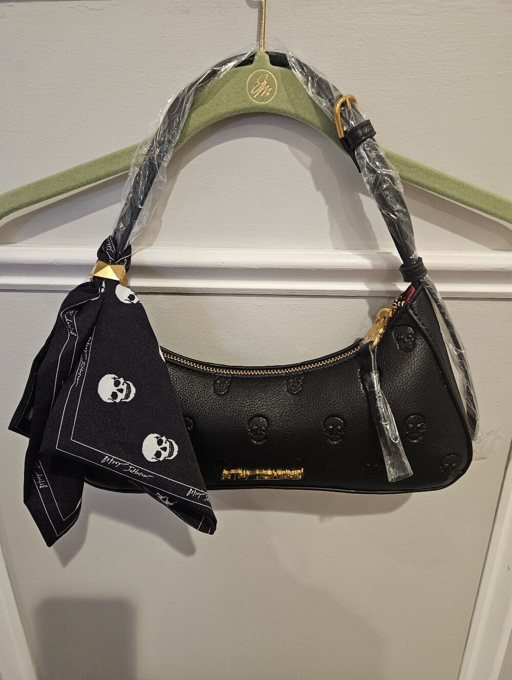 Betsey Johnson Black Leather Shoulder Bag with Skull Emboss and Scarf Accent